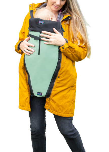 Our coat extension systems are designed with superior quality, efficiency and style in mind.  Each coat extension expands the front of your own winter jacket to keep your pregnant belly or baby in a carrier warm throughout the winter months.  No need to sacrifice style for maternity attire or babywearing!